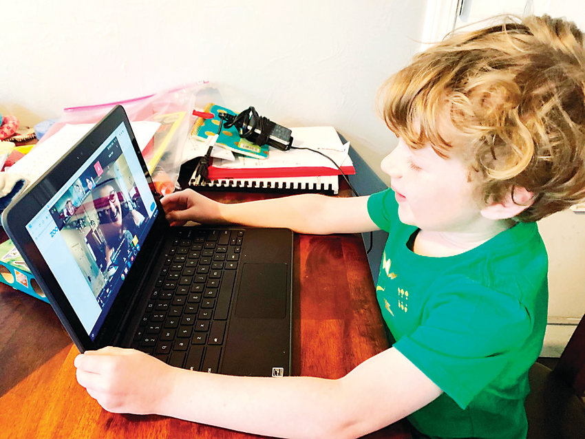 Vanderhoof Elementary first-grader Ville Hulme video chats with his teacher during the first week of Jeffco's remote learning plan..